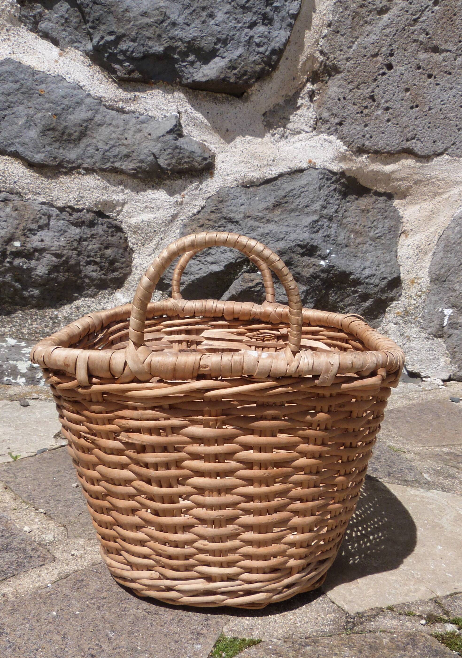 Small wicker basket with handles