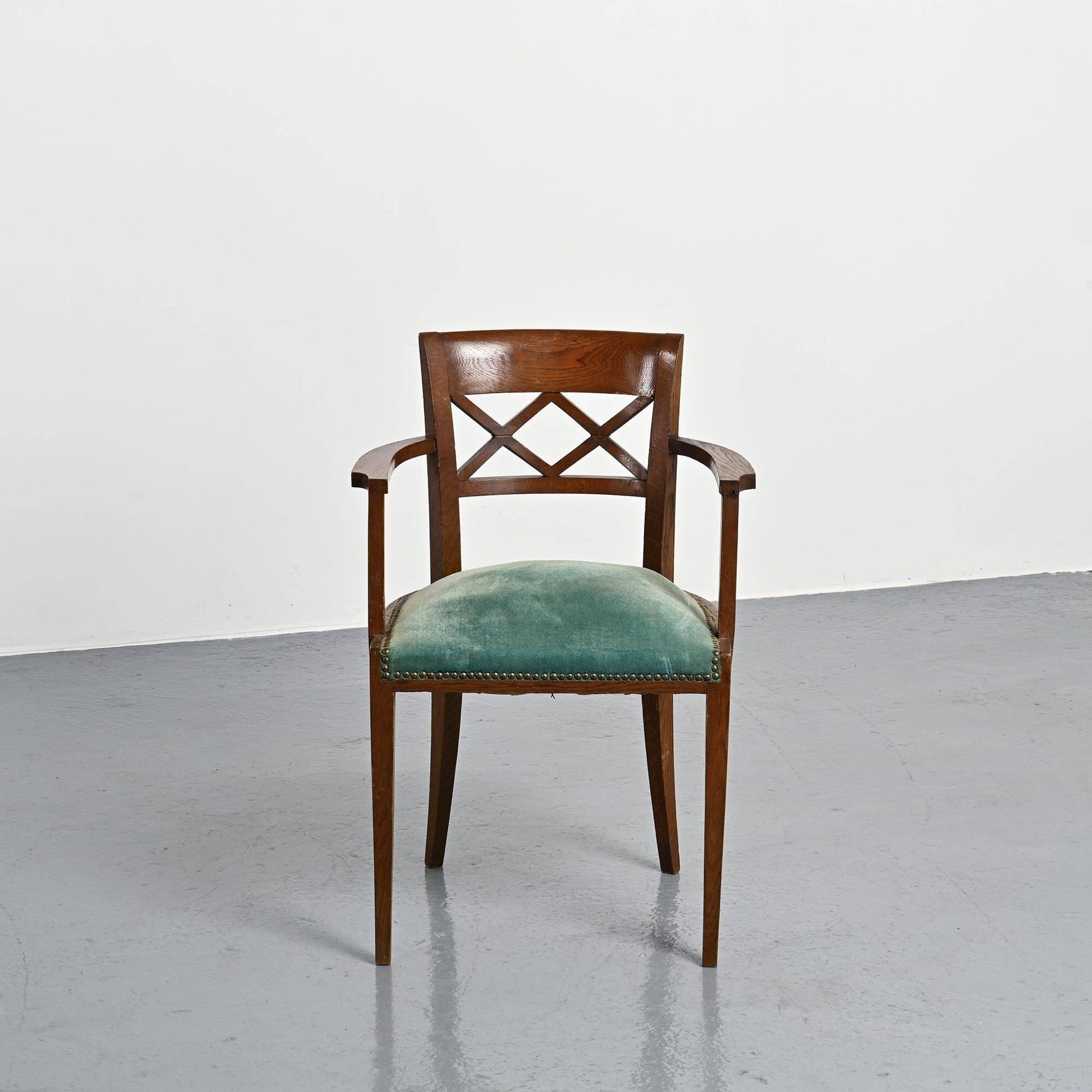 Set of four Art Deco armchairs in wood, France, circa 1940.