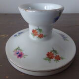 Old candle holder in flowered porcelain