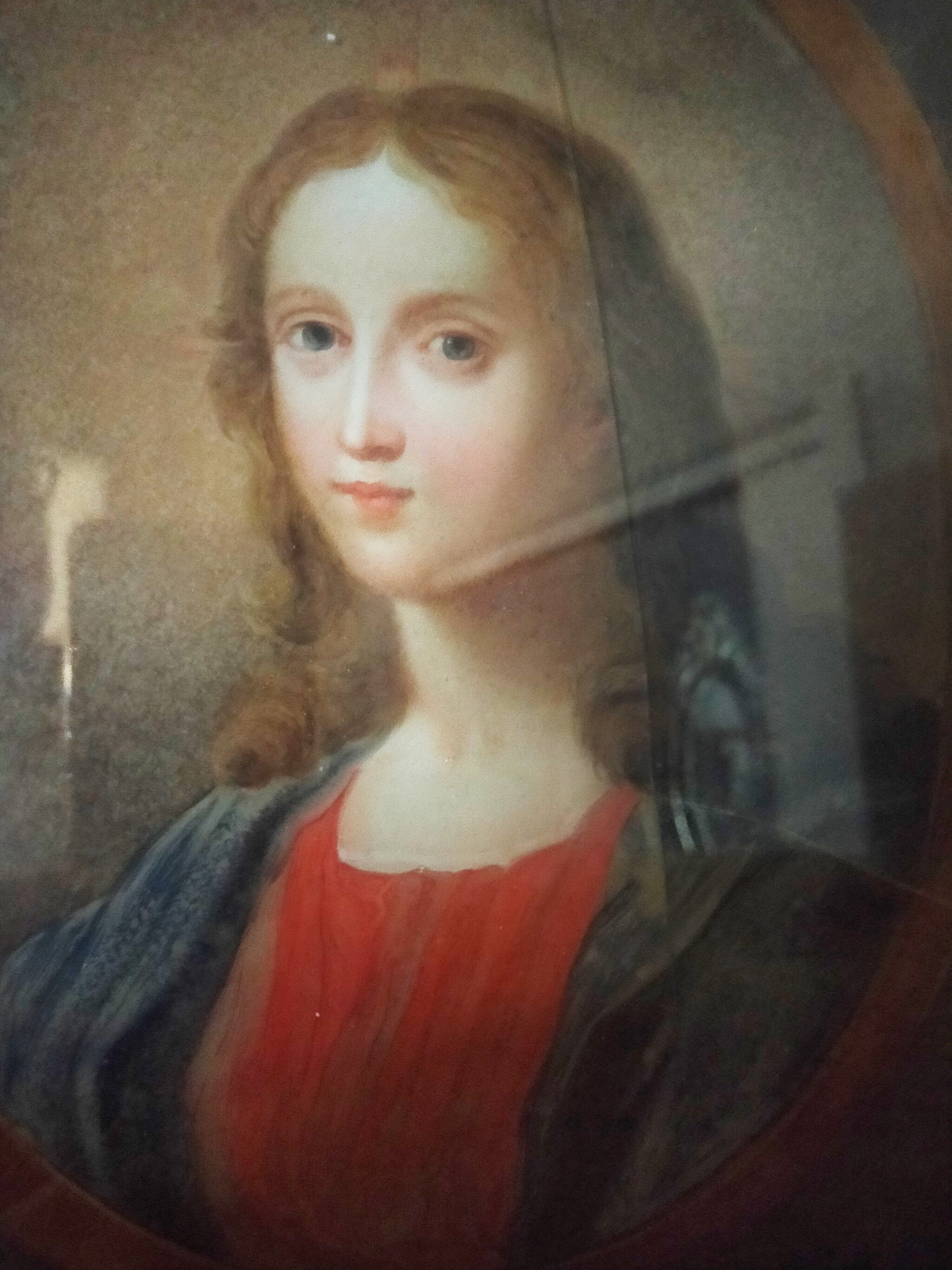 Ancient painting on glass depicting a female figure XVlll century