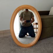 Vintage oval mirror in beech from the 70s/80s.