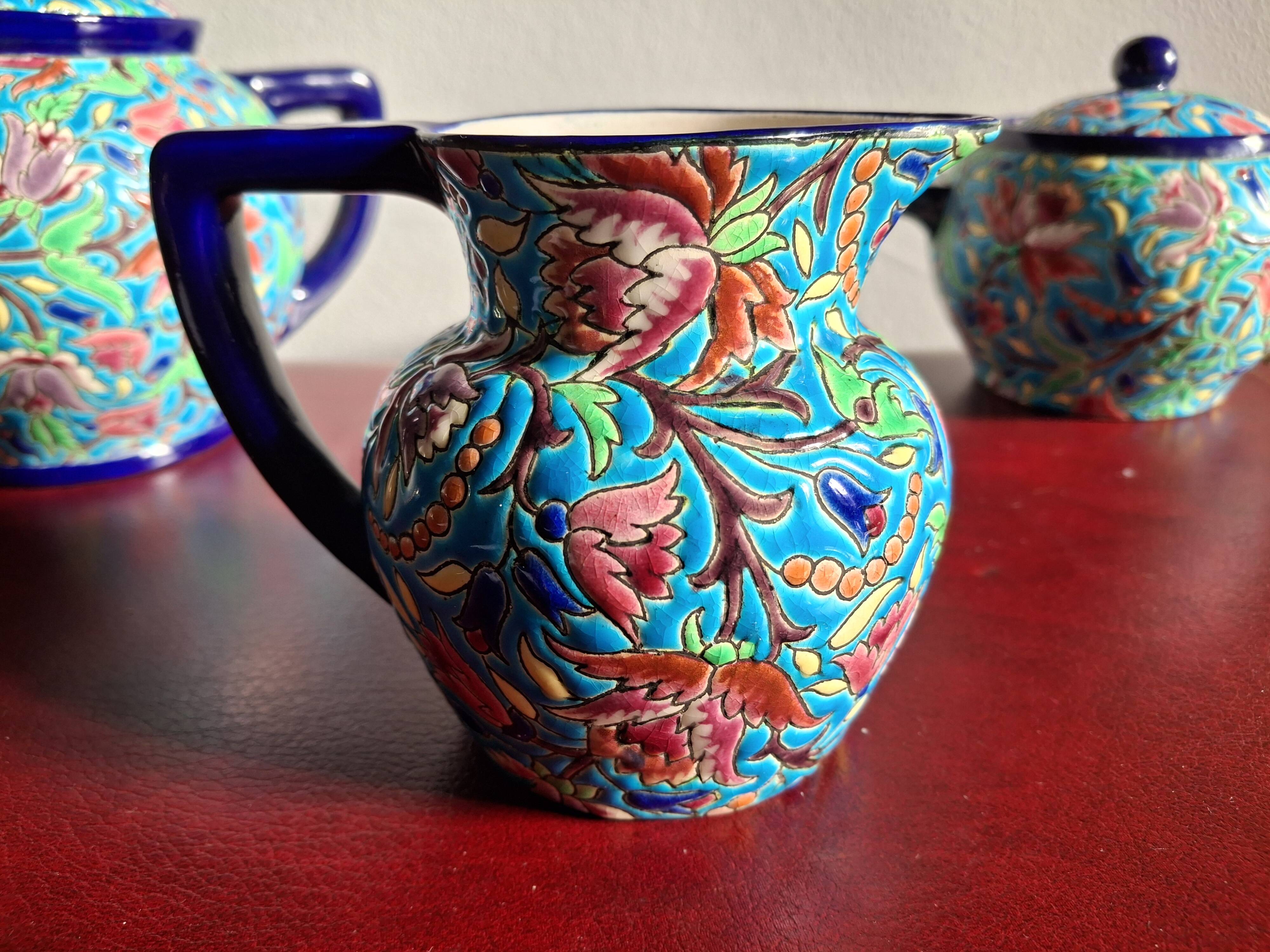 Cloisonné enamel tea service from Longwy in excellent condition.