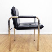 Set of 4 leather and tubular steel armchairs