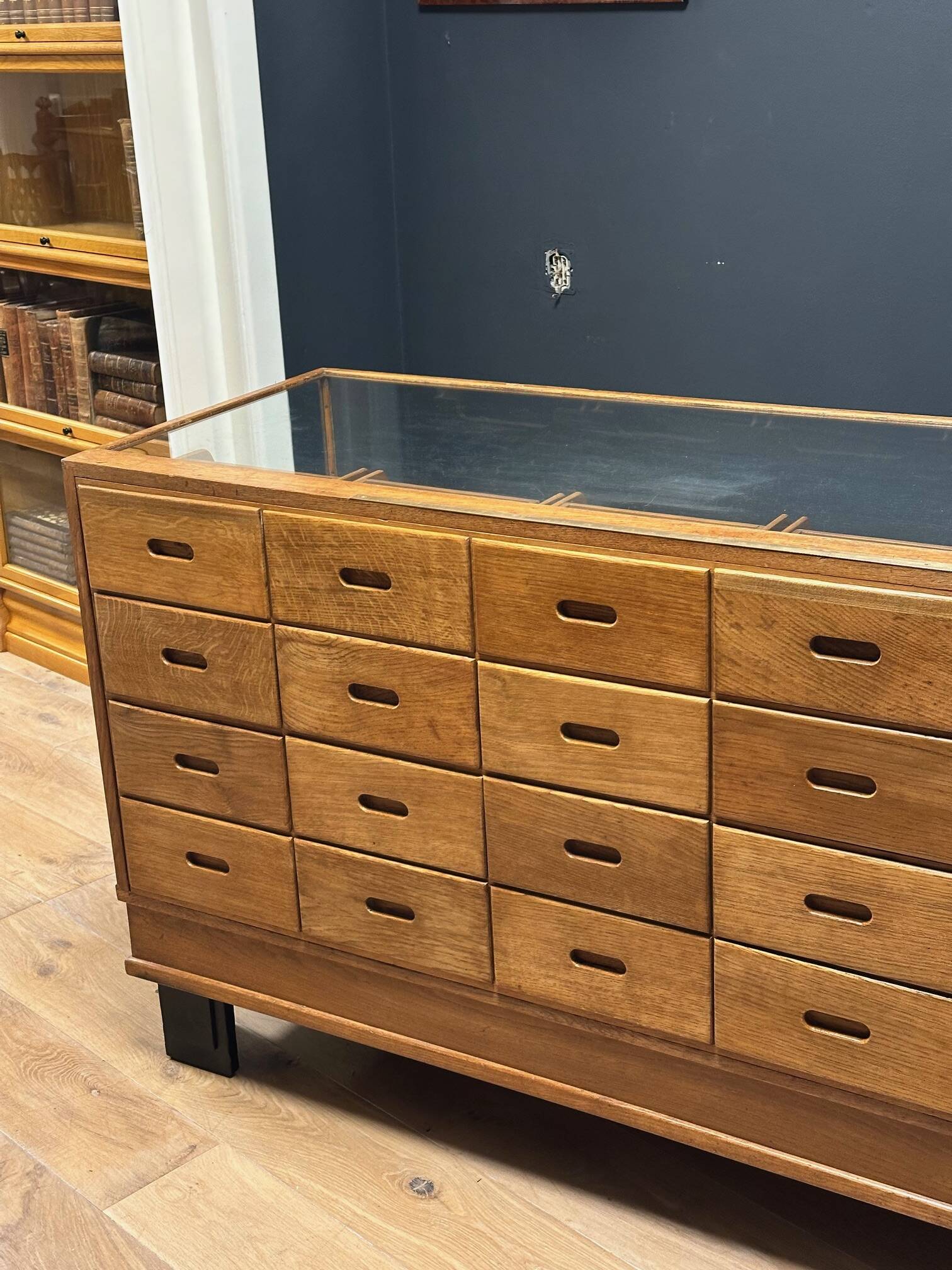 Old oak display counter with 24 drawers
