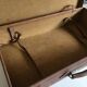 Suitcase of leather with labels of palaces