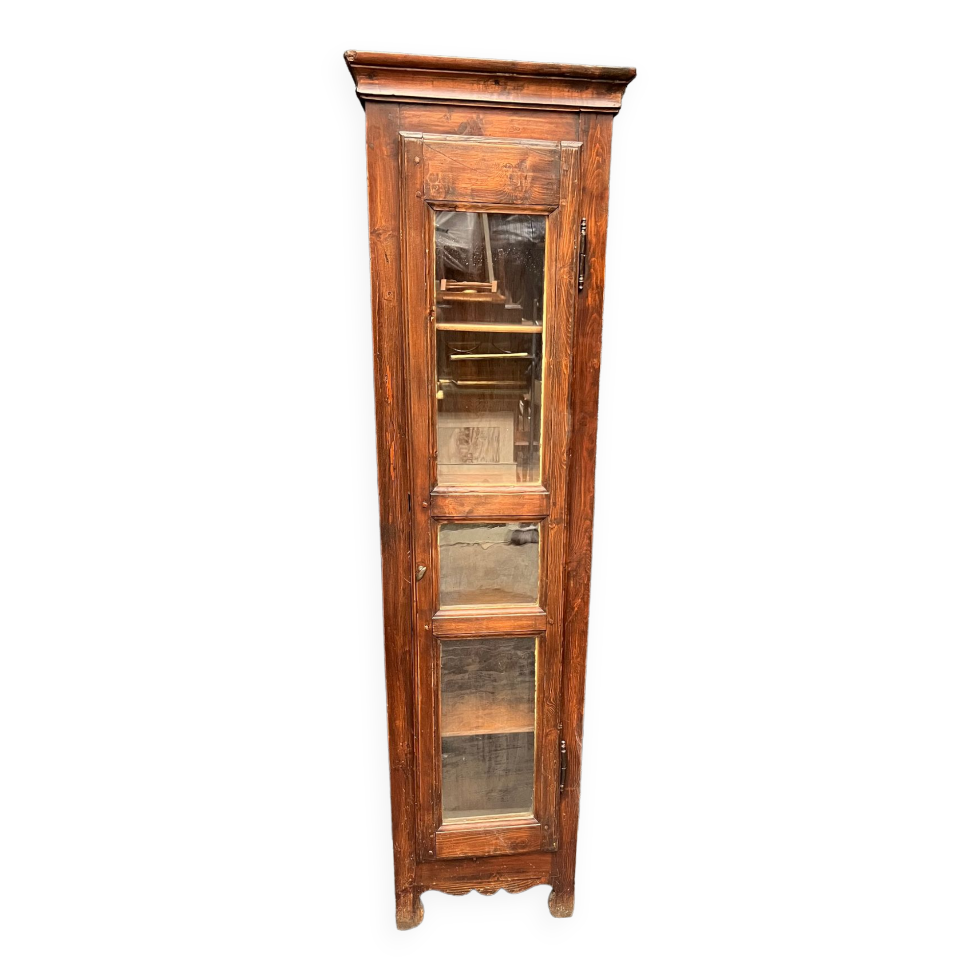 Old narrow wooden showcase.