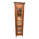 Old narrow wooden showcase.