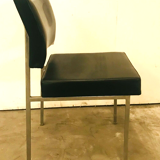 Suite of eight vintage chairs in chrome and imitation leather XX century