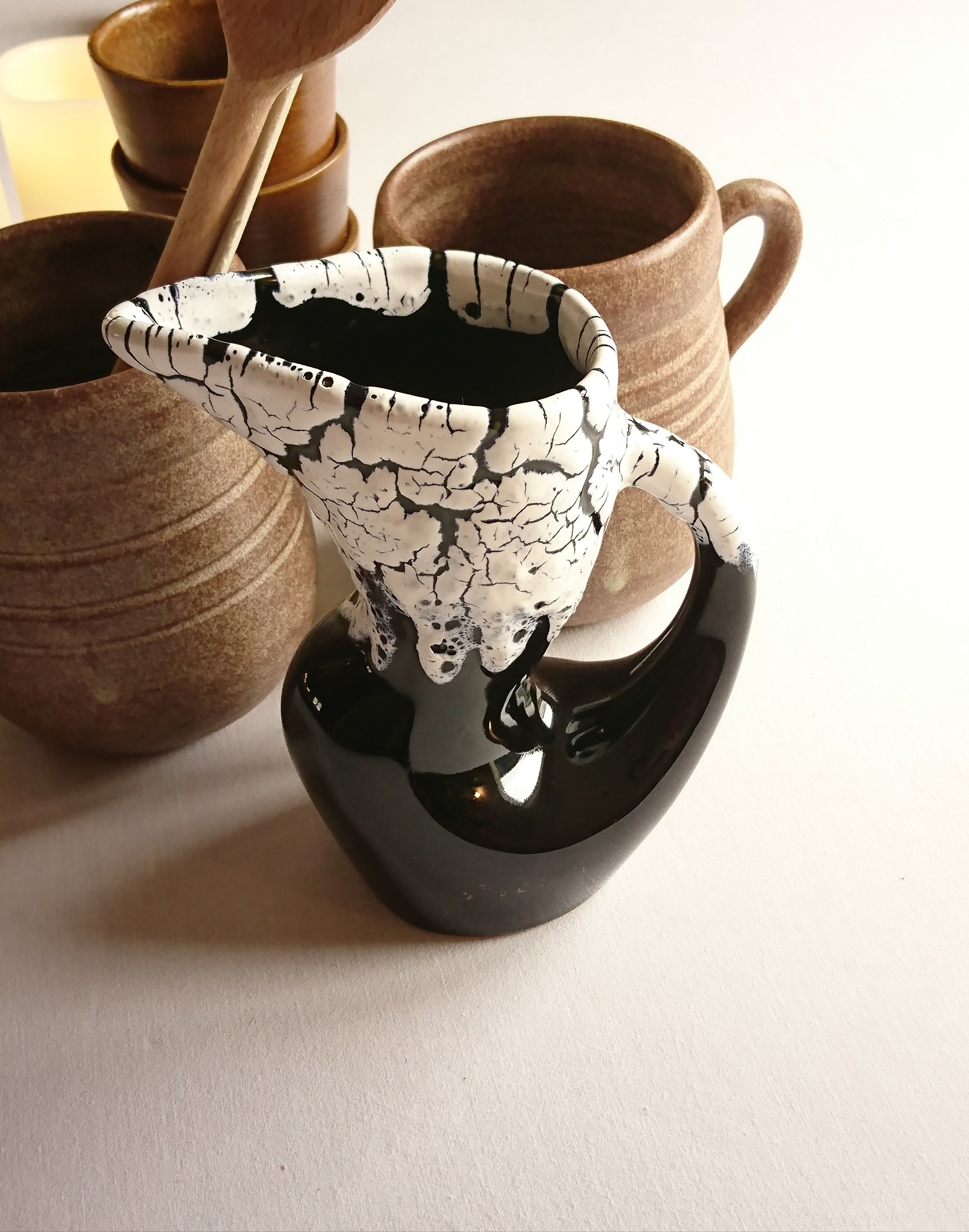 Ceramic pitcher fat lava midnight blue and white signed