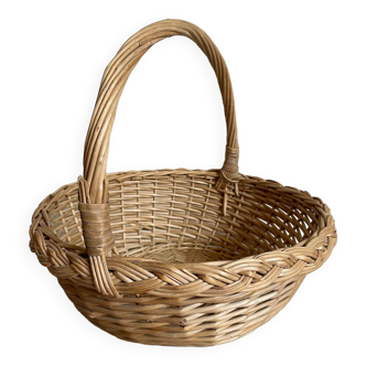 Beige round wicker basket