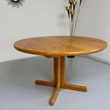 Antique round Scandinavian dining table from the 70s with 1 solid wood extension