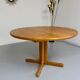 Antique round Scandinavian dining table from the 70s with 1 solid wood extension