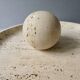 Large cup and its sphere, in travertine, 1970s