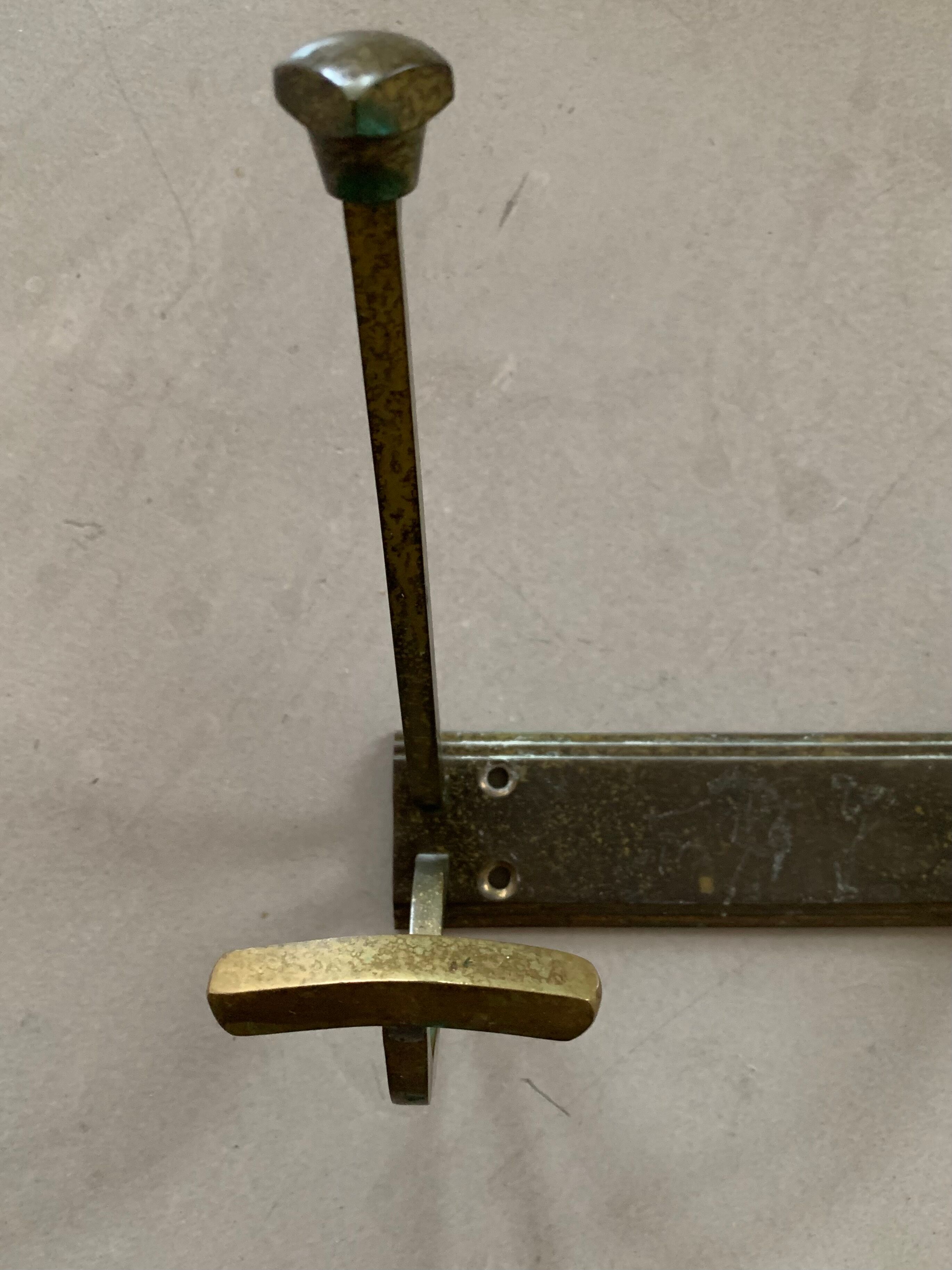 Antique brass wall coat rack