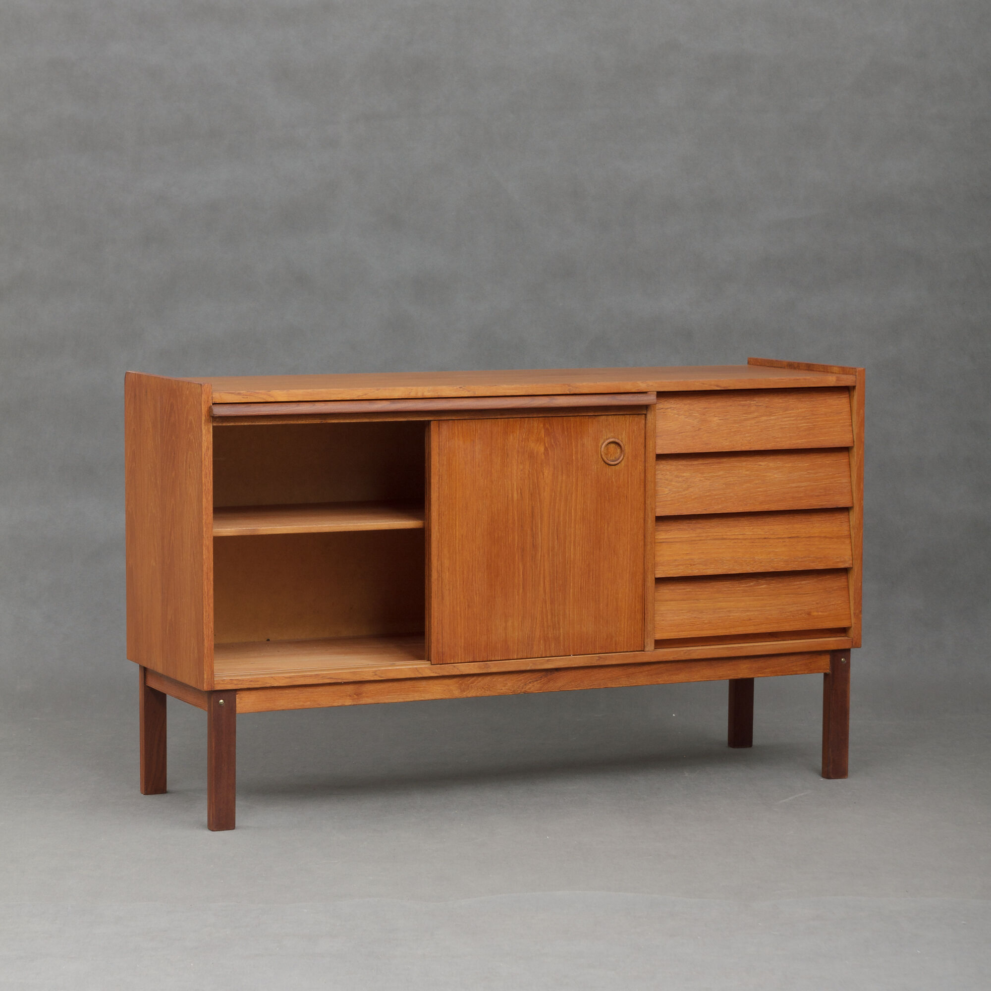 Small Danish teak sideboard with a pull out tray