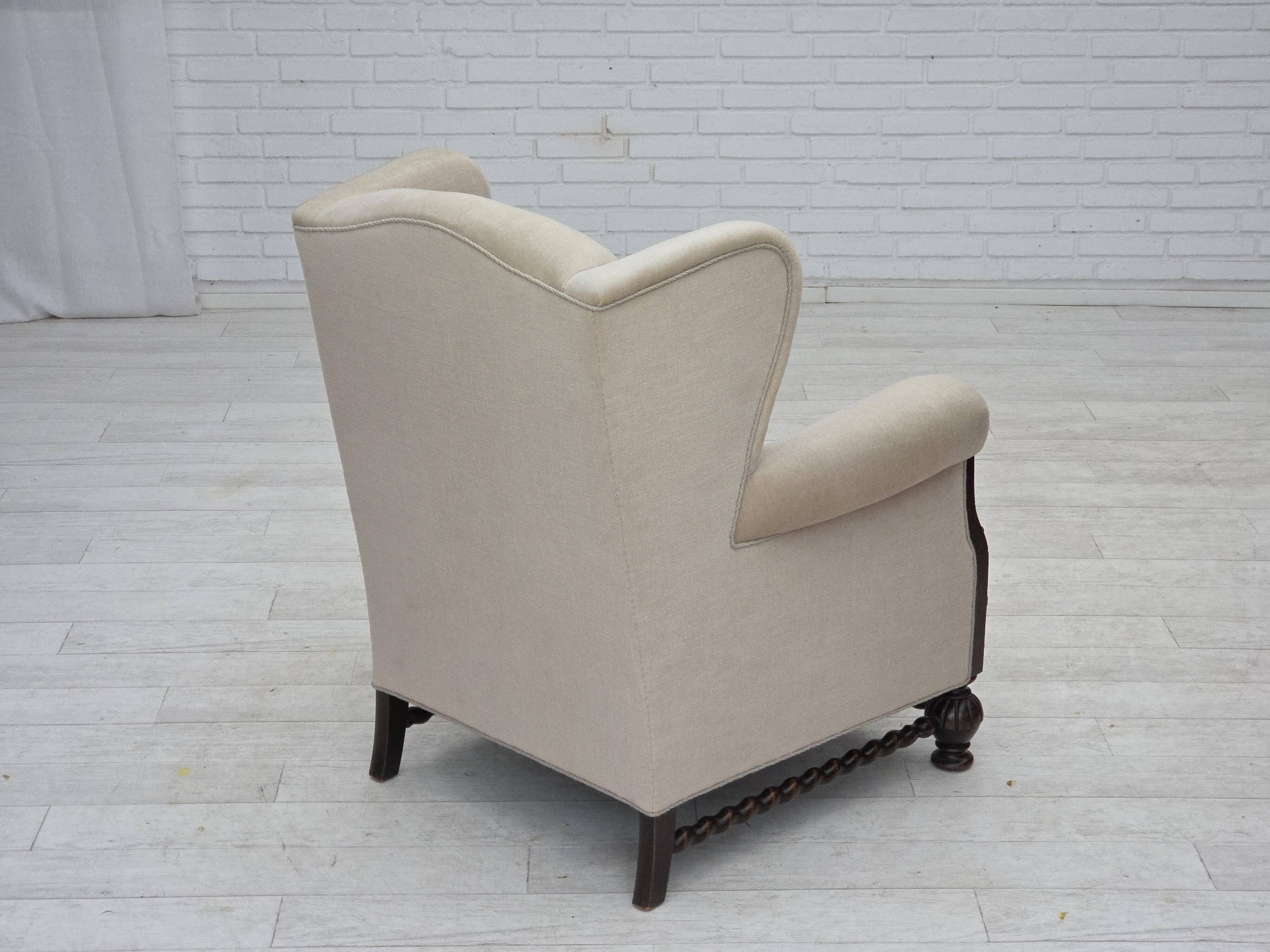 1960s, Danish wingback armchair, furniture velour, carved oak wood.