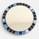 Round mosaic mirror in the style of Vallauris, France circa 1970.