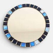 Round mosaic mirror in the style of Vallauris, France circa 1970.