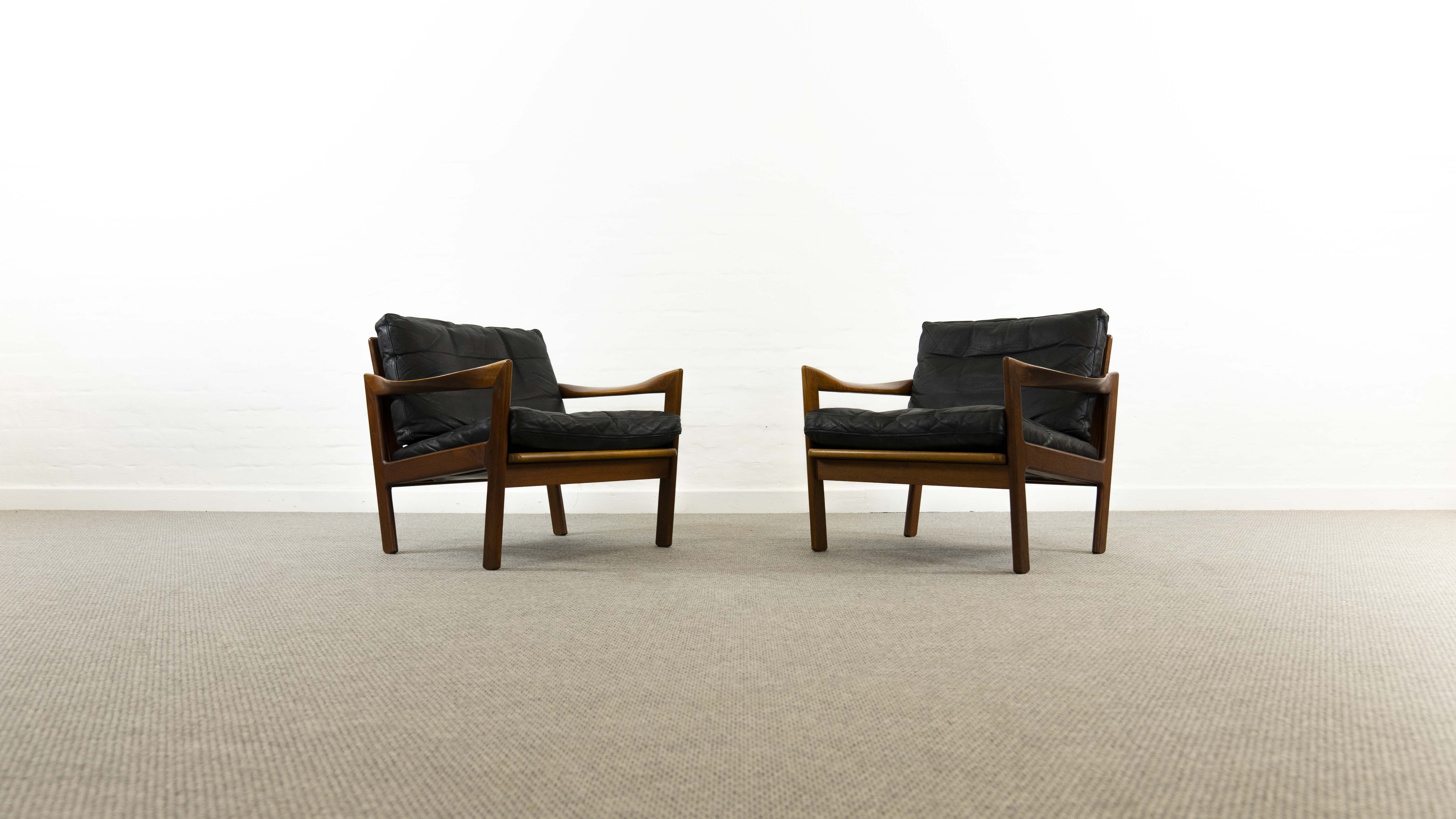 Pair of teak chairs in black leather by Illum Wikkelsoe for Niels Eilersen, Denmark