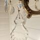Pair of tassel sconces