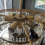 Old brass chandelier and crystal grapevines