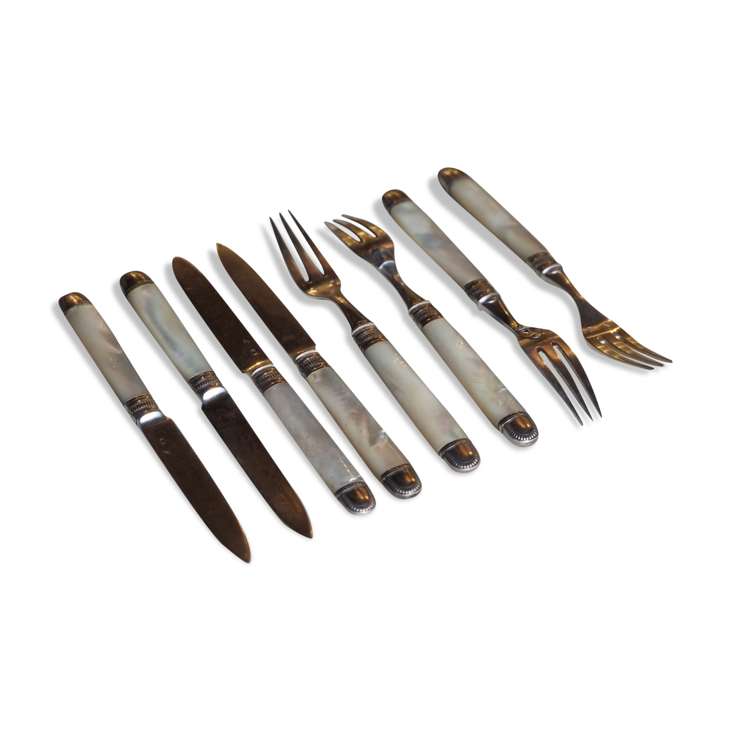 Knives and forks, XIXth, silver blades and forks, mother-of-pearl handle, minerva hallmark