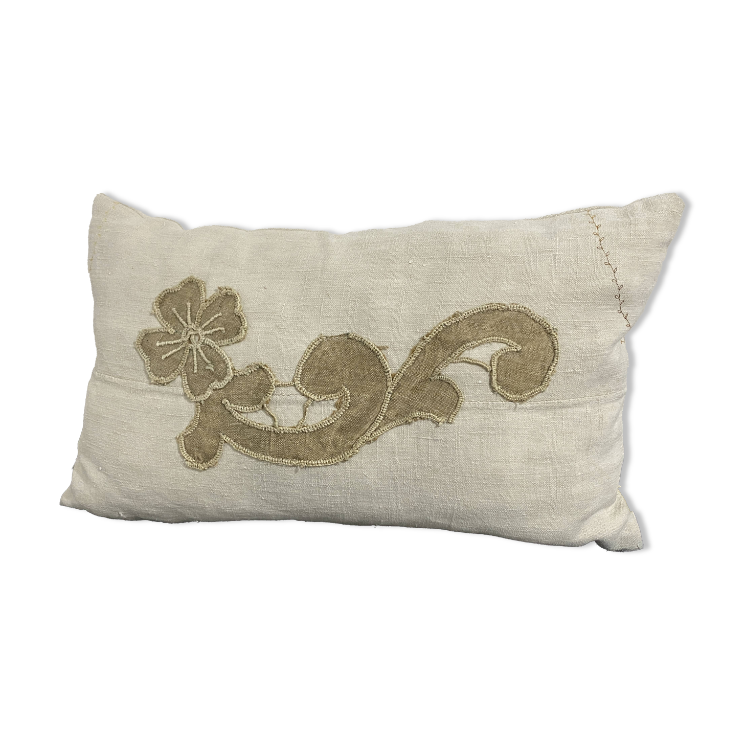 Cushion in vintage fabric with ornamentation