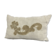 Cushion in vintage fabric with ornamentation.