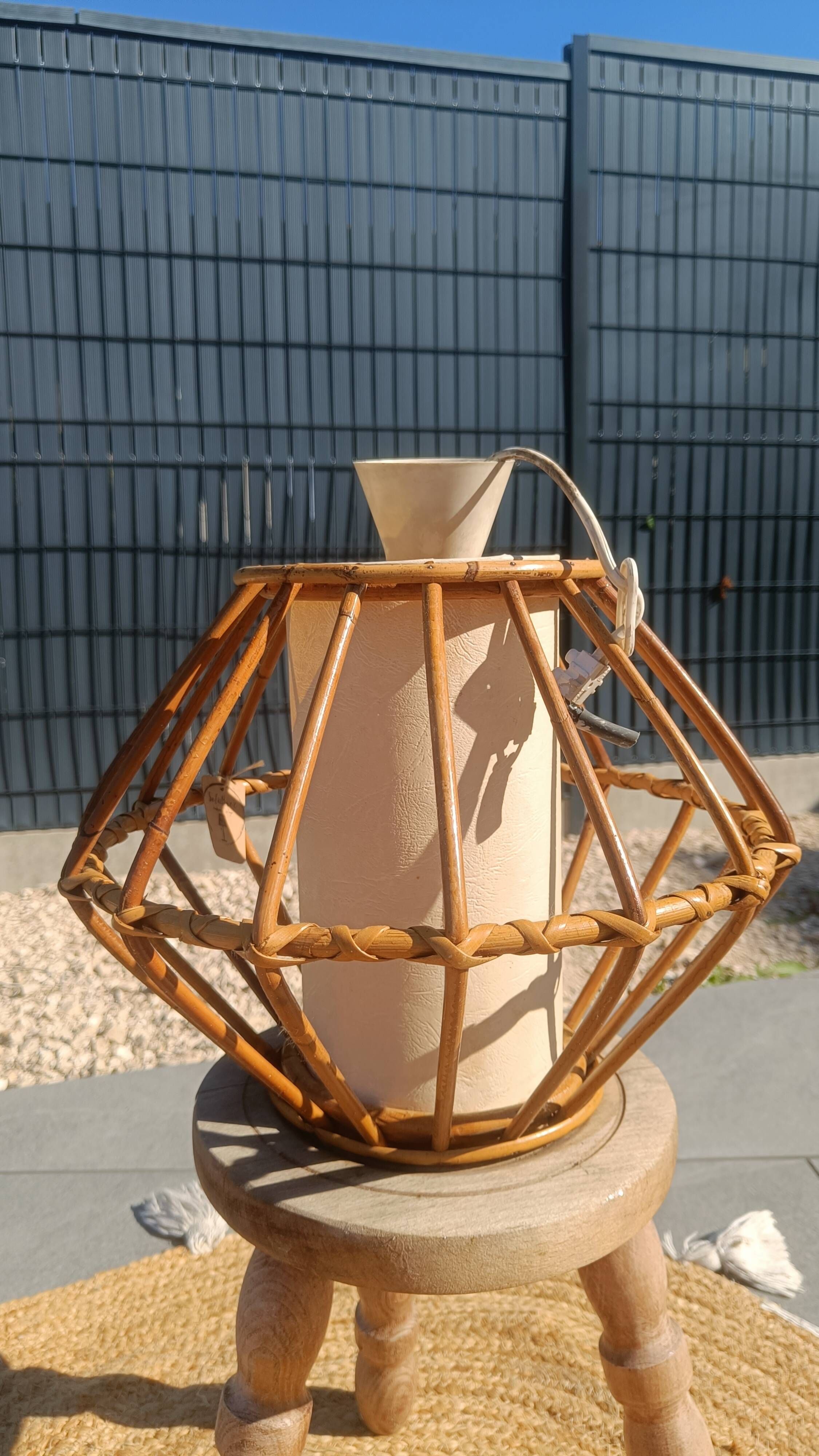 Vintage rattan and bamboo pendant light with removable shade.