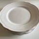 Set de 4 assiettes de Mougins en terre émaillée blanche à godrons