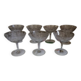 Beautiful set of seven crystal champagne glasses engraved with vine branches