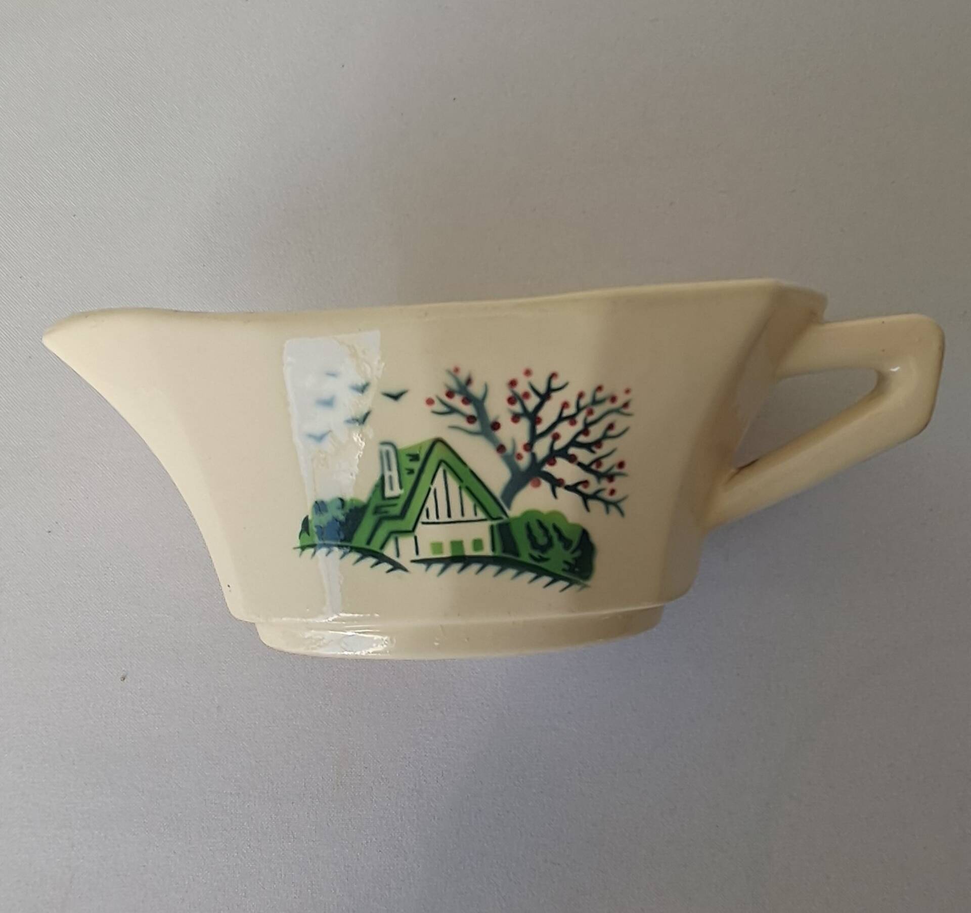 Bayeux model sauce boat from Digoin Sarreguemines. Vintage.