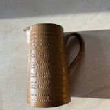 Vintage handmade earthenware pitcher