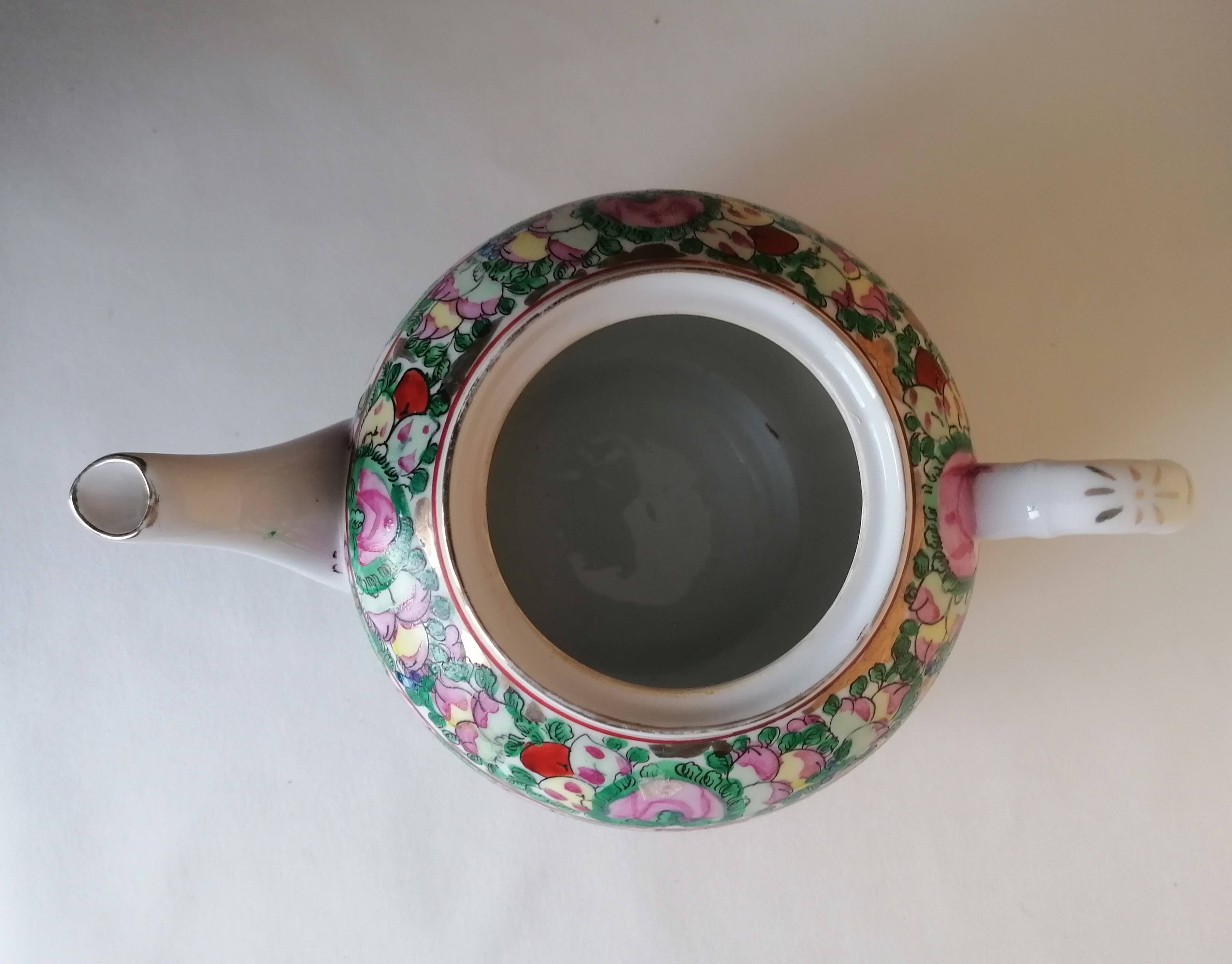 Canton porcelain tea service with 6 cups and teapot.