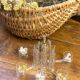 Knife rests, flower vases and candle holders in blown glass.