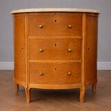 Half-moon commode in burl wood with a marble top.
