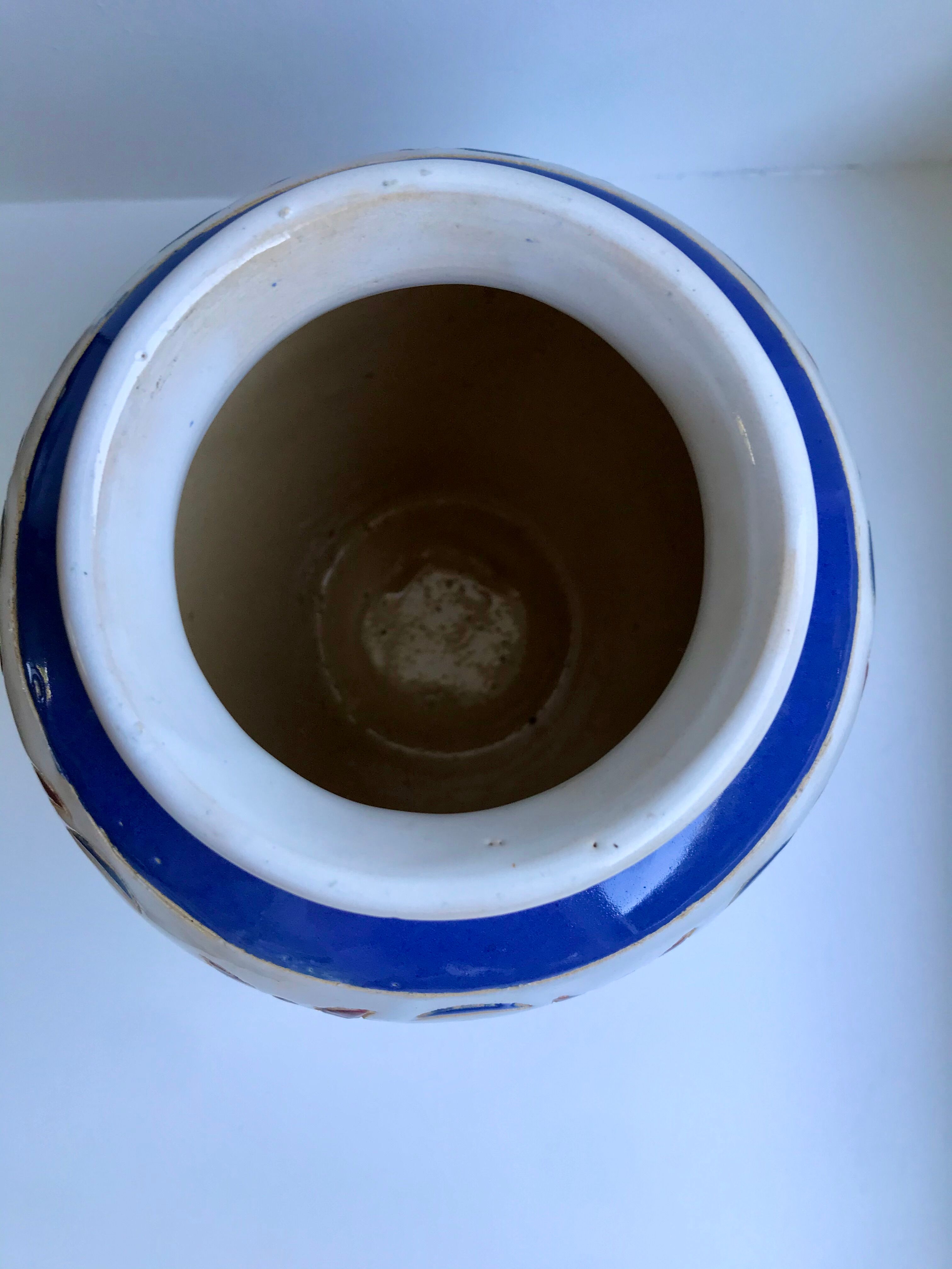 Vase en céramique peint et signé vintage