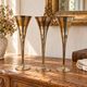 Set of 3 vintage silver-plated and gold footed cups.