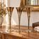 Set of 3 vintage silver-plated and gold footed cups.