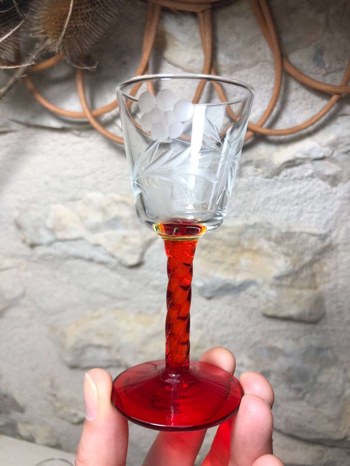 Antique and rare! Sold in a set of 12 colorful twisted stemmed glasses engraved with flowers and leaves