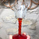 Antique and rare! Sold in a set of 12 colorful twisted stemmed glasses engraved with flowers and leaves