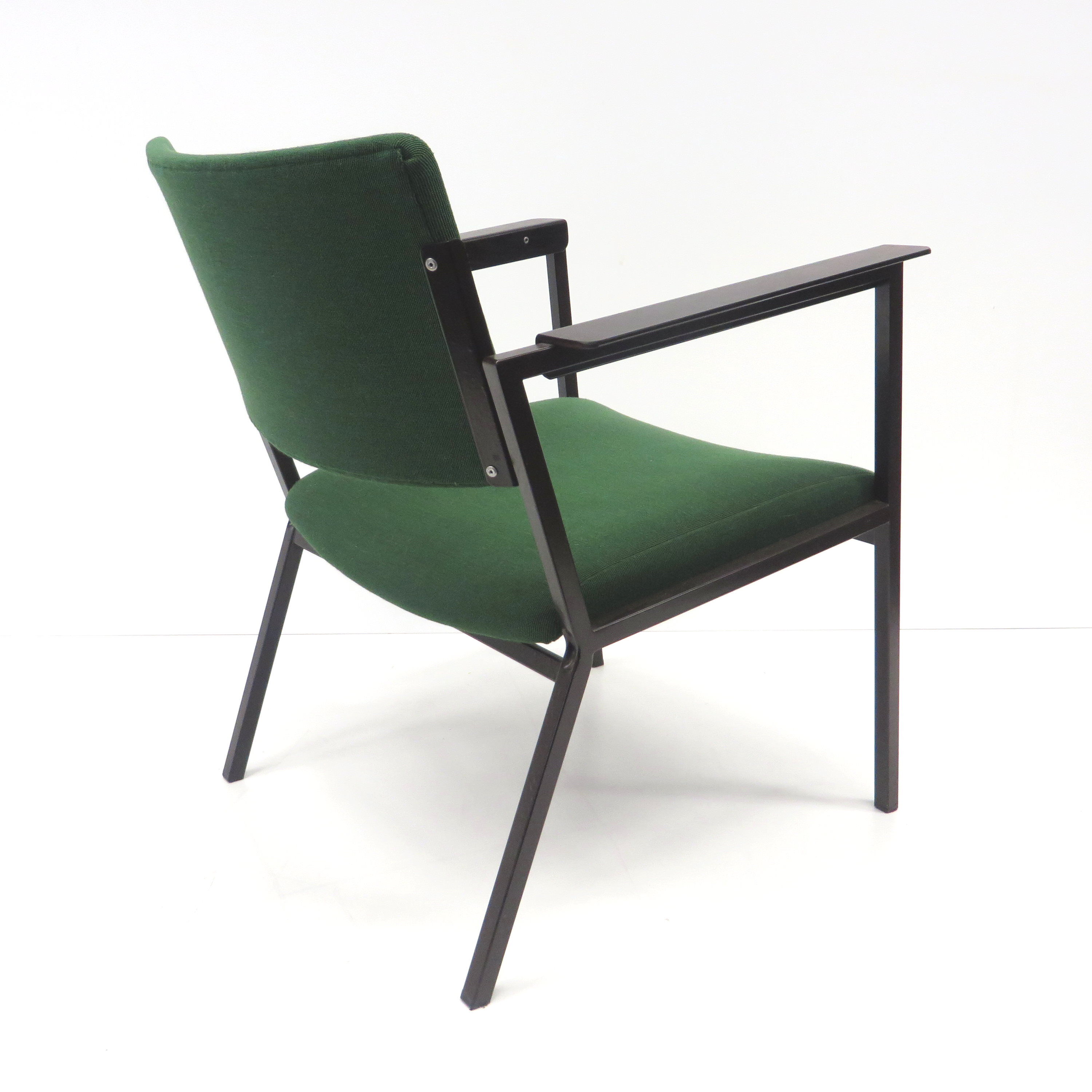 Green vintage armchair with metal frame made in the 60s