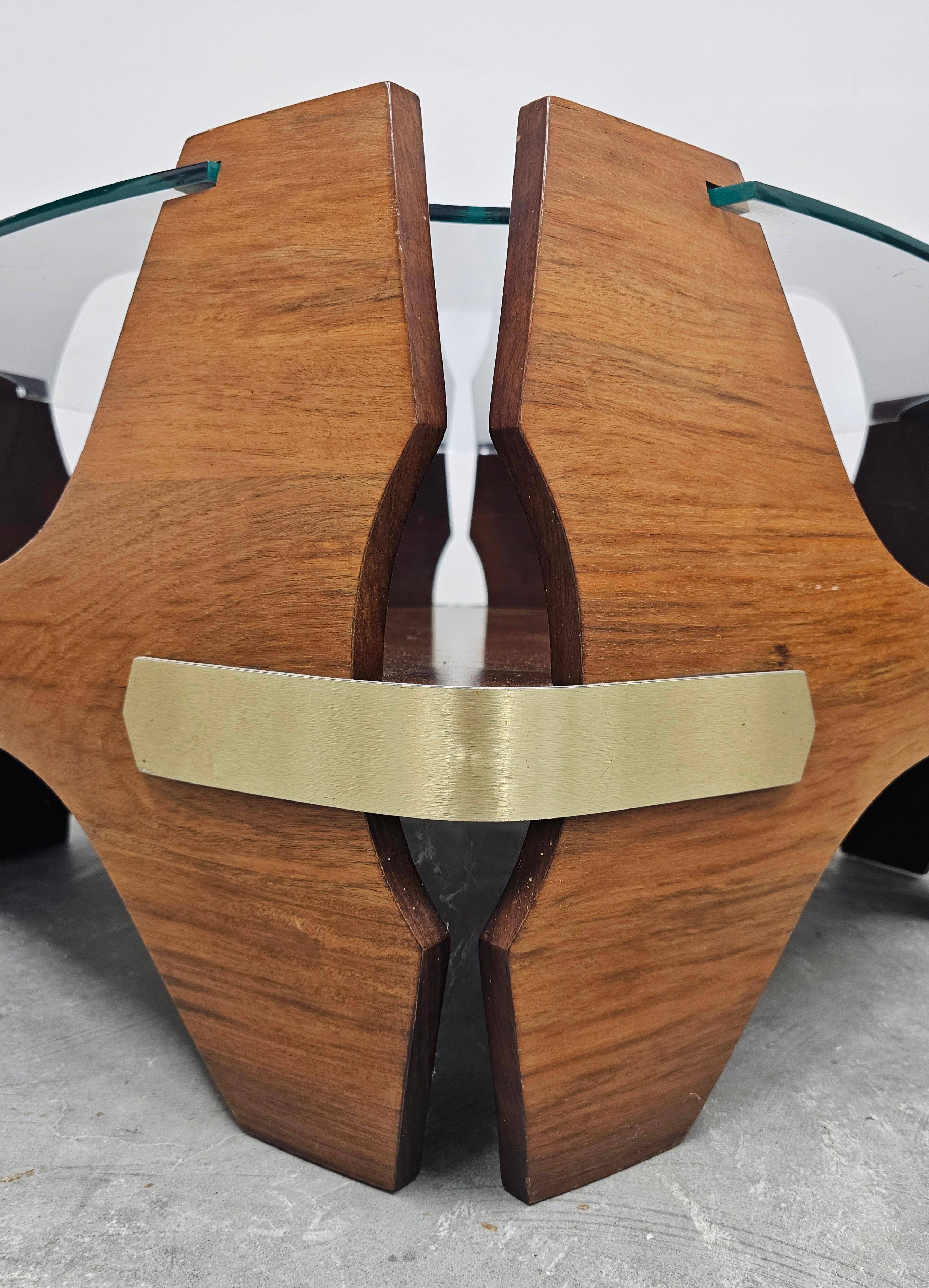 Mid-century coffee table in curved plywood with a glass top, 1940s.