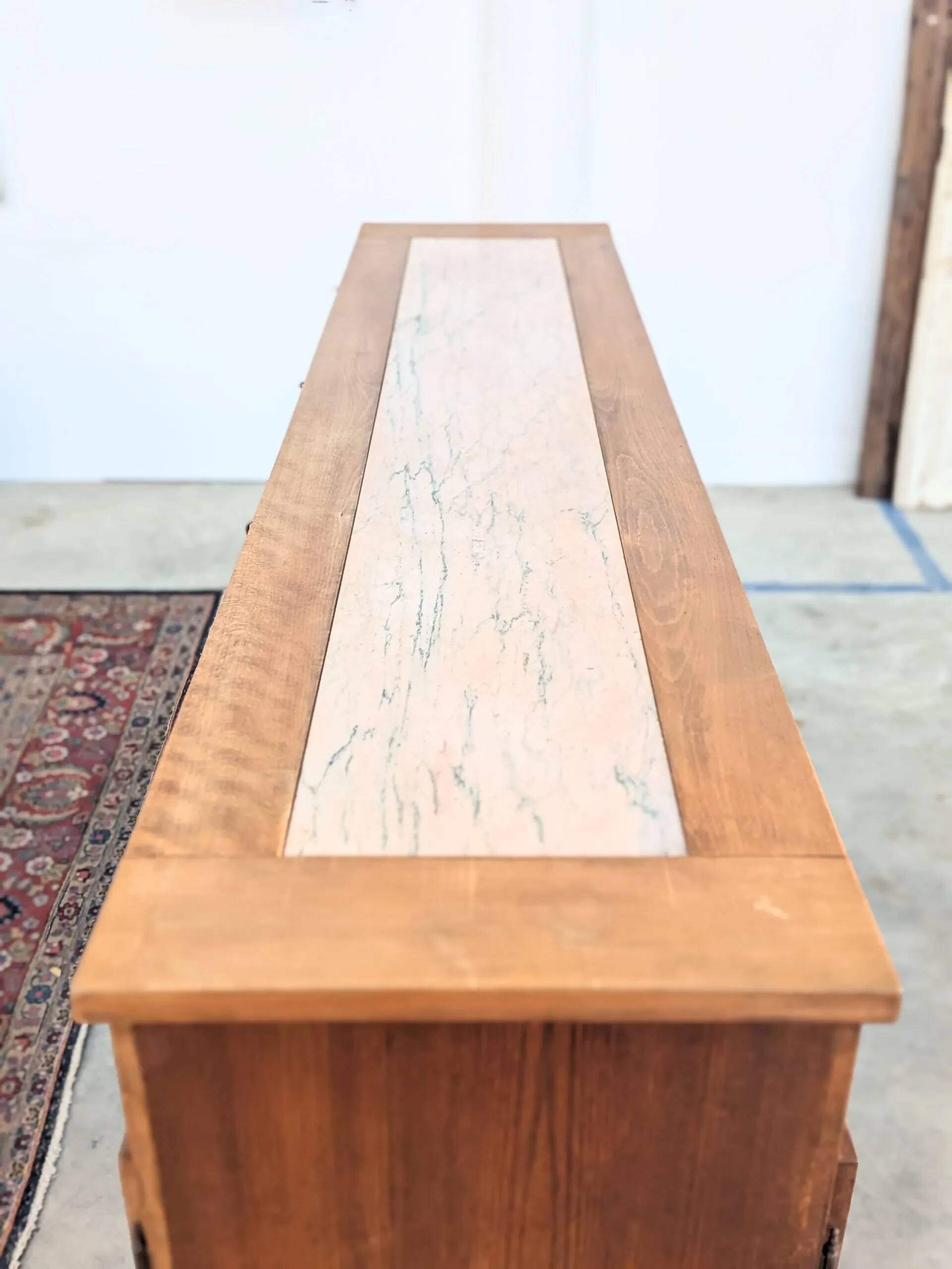 Double-sided counter in wood and pink marble (233 cm)