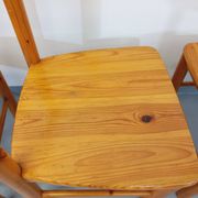 Suite of a round table with extension and 4 vintage pine chairs from the 60s and 70s