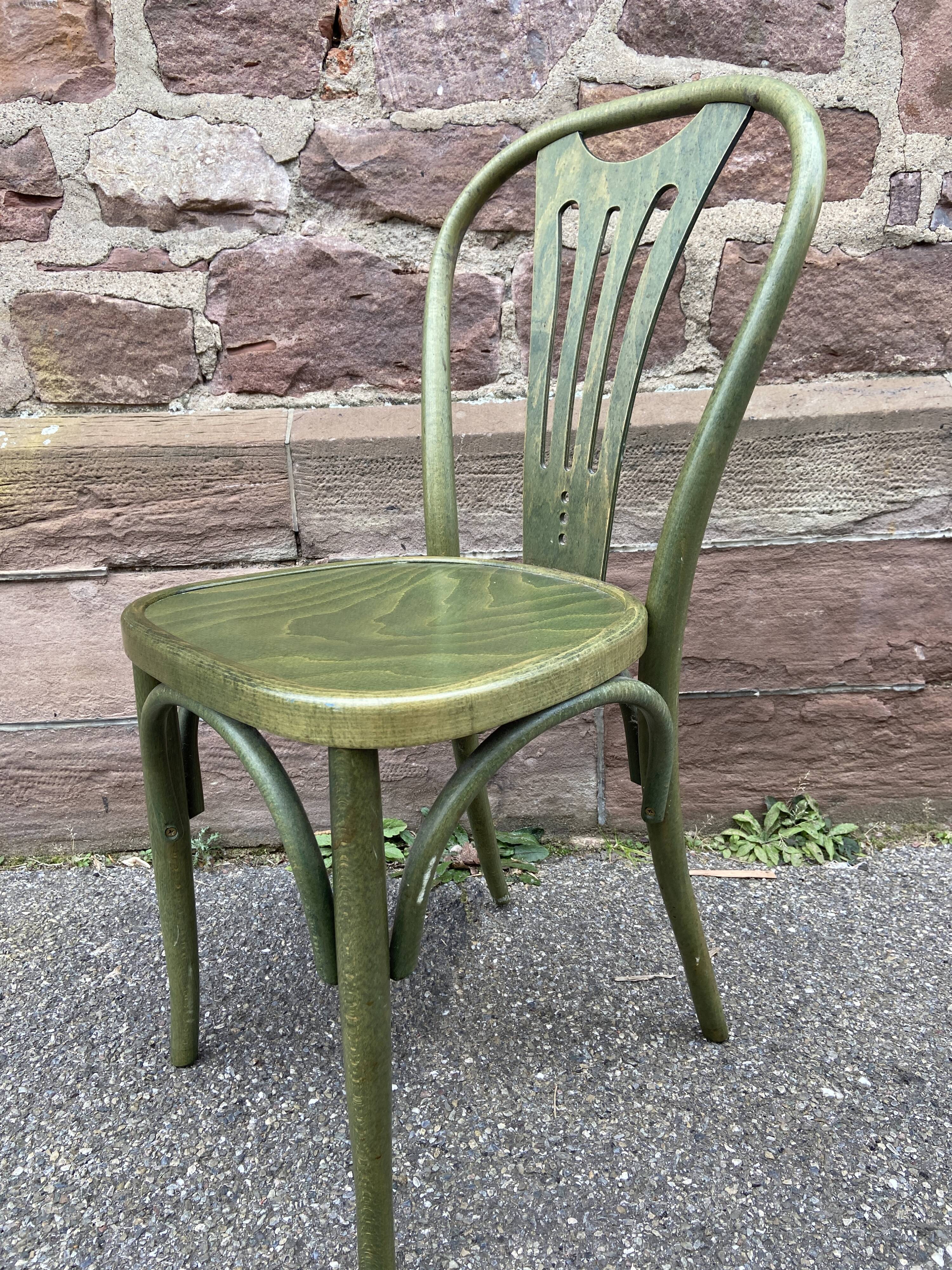 2 curved wooden bistro chairs