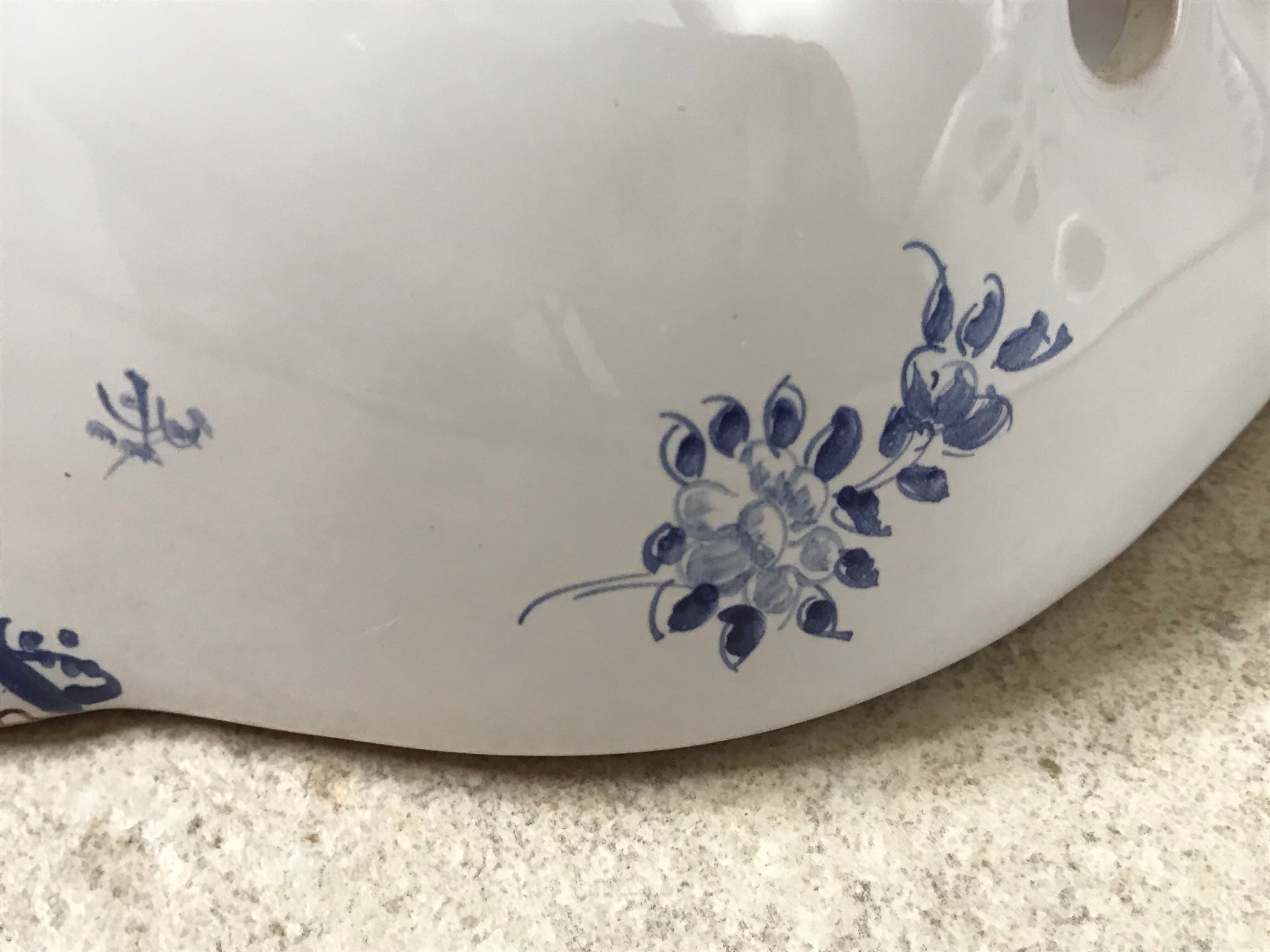 Pair of ceramic moustiers sconces