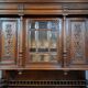 Buffet deux corps richement sculpté – Style Henri II en noyer