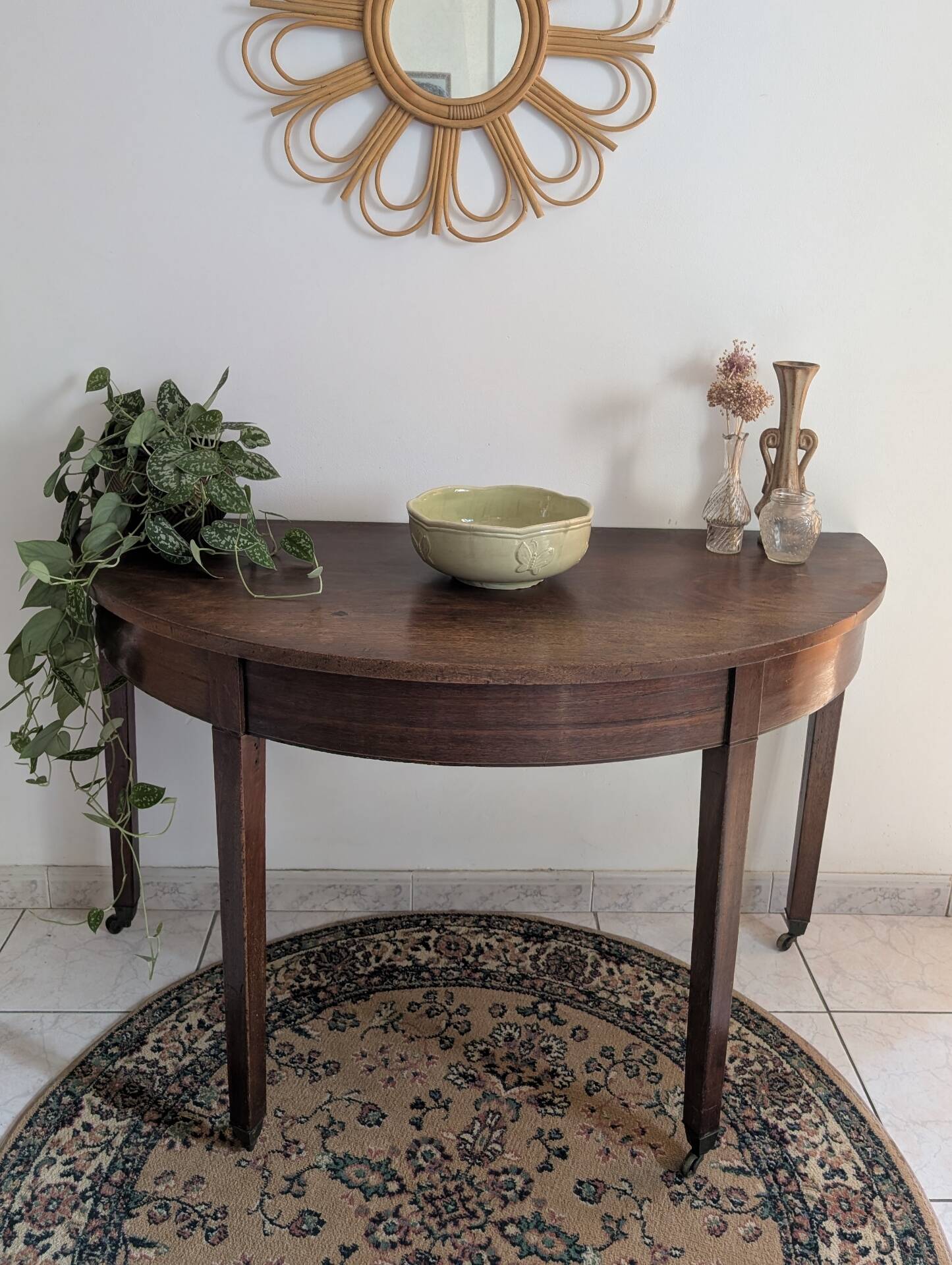 Old half-moon table or serving trolley on wheels