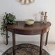 Old half-moon table or serving trolley on wheels